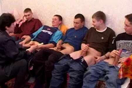 A mature mother measured the length of the young boys dicks.