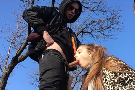 A brunette in a fur coat sucks off a tough Russian guy.